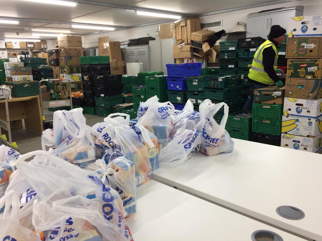 Packing up the food parcel donations at the Foodbank in Bournemouth