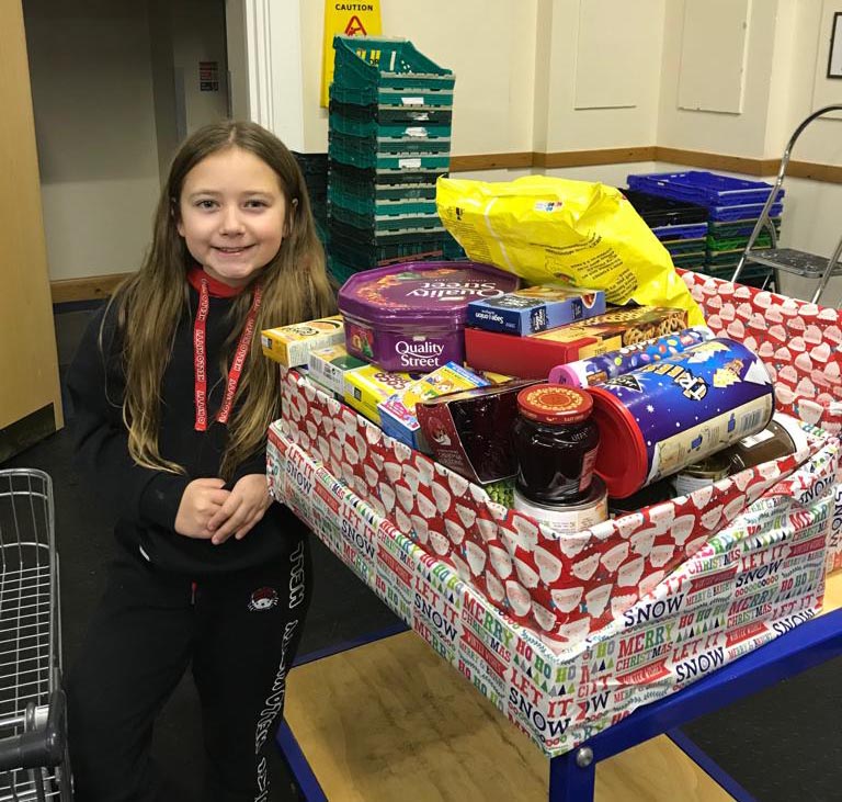 Volunteer with Foodbank Christmas Parcel Donations